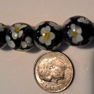 Vintage glass beads with flowers inside